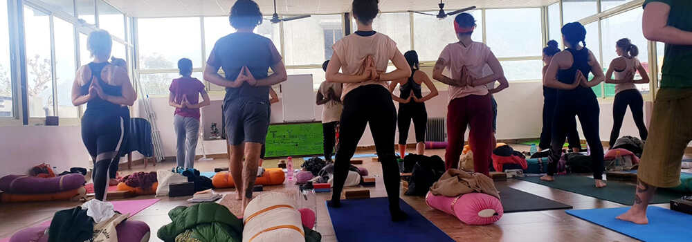 Ashtanga yoga practice at Rishikesh Yoga Teacher Training Center