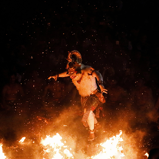 a guy perform fire dance
